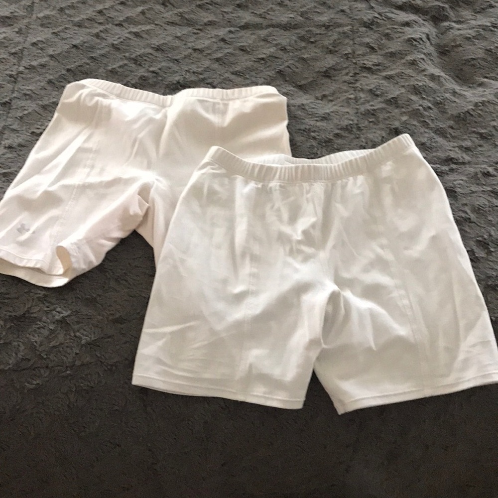2 pairs of white spandex shorts